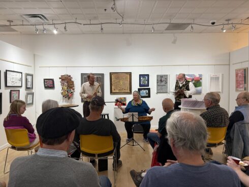 Image showing several musicians performing during open mic night in the glallery